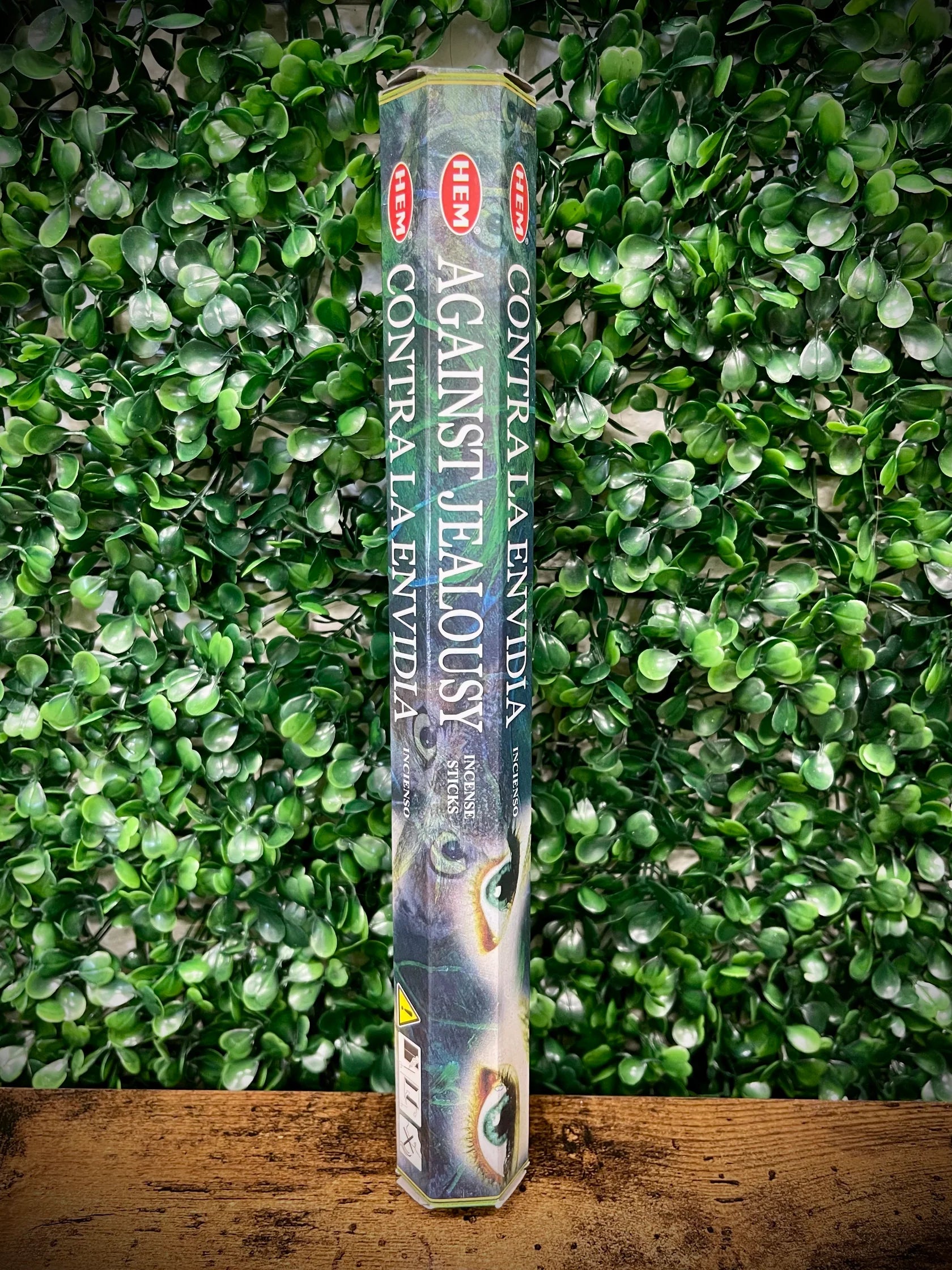 Packaged product against a green leafy background