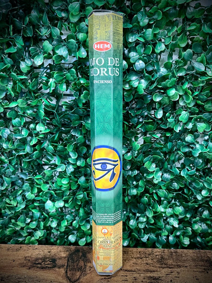 Hem incense stick packaging with green leafy background