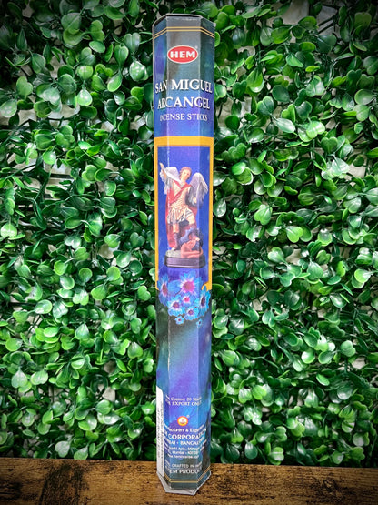Hem San Miguel Arcangel incense stick packaging against a green leafy background